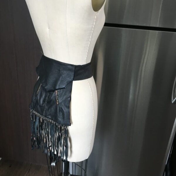 Black leather fringed waist belt.